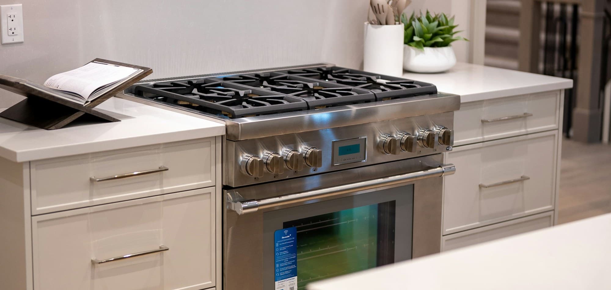 Premium kitchen with a professional-style gas range and built-in oven